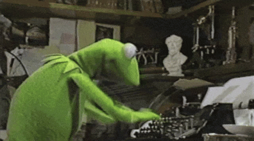 A GIF of Kermit the frog typing.